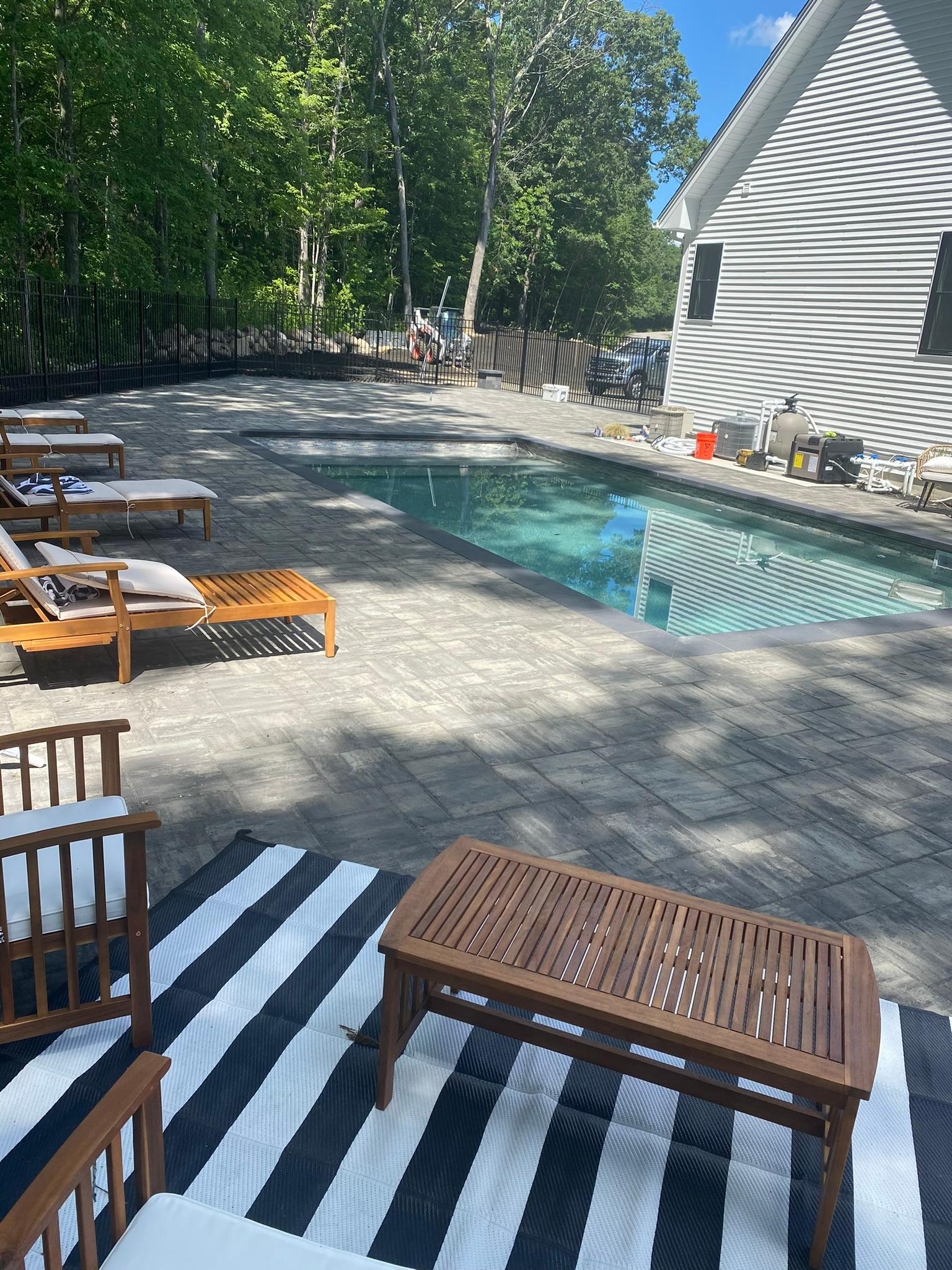 pool by side of the house