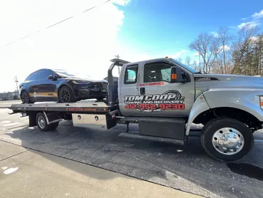 Images Tom Coop LLC Towing and Recovery