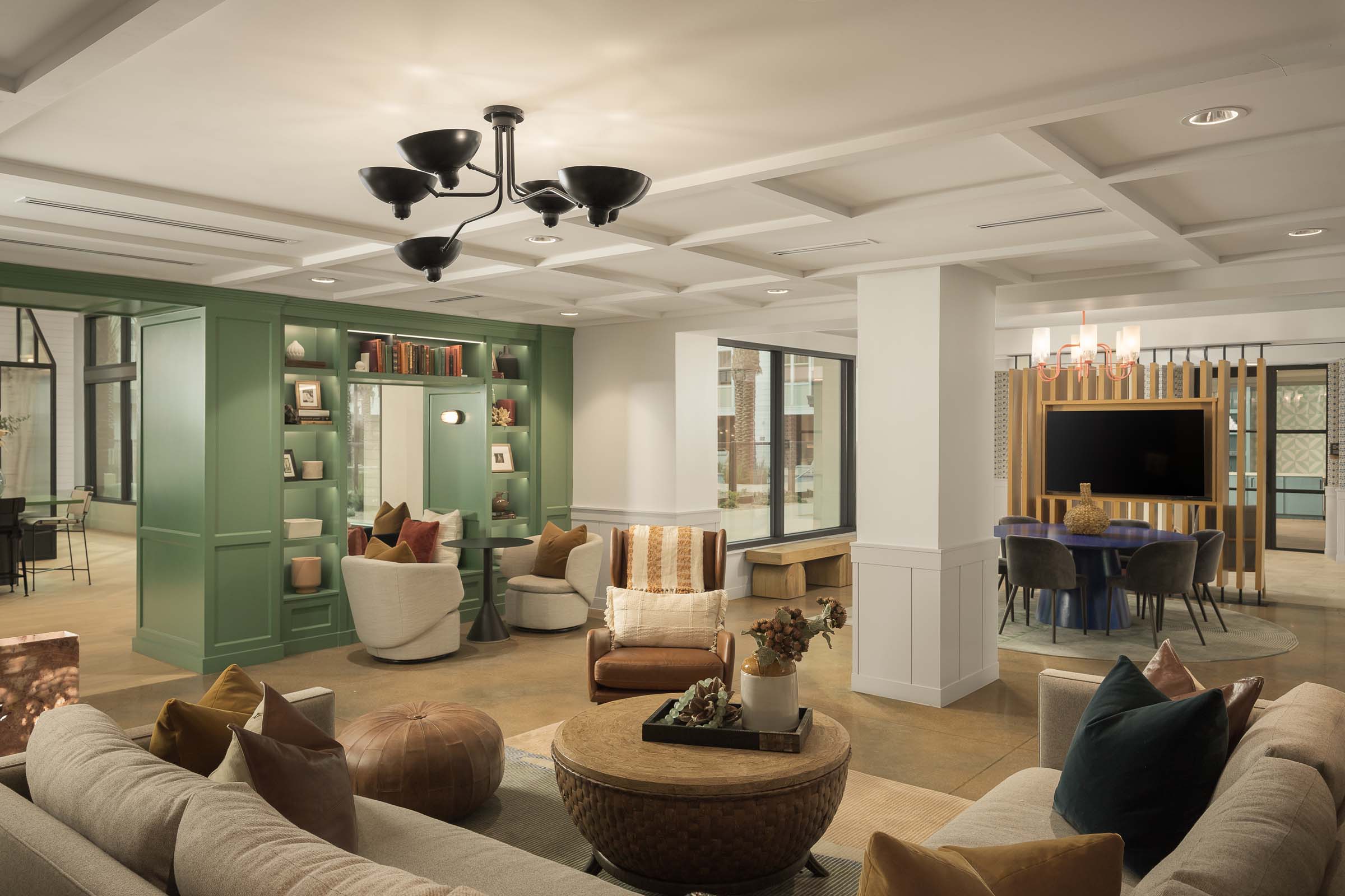 Resident lounge multiple seating areas at Camden Gilbert apartment homes in Gilbert, AZ