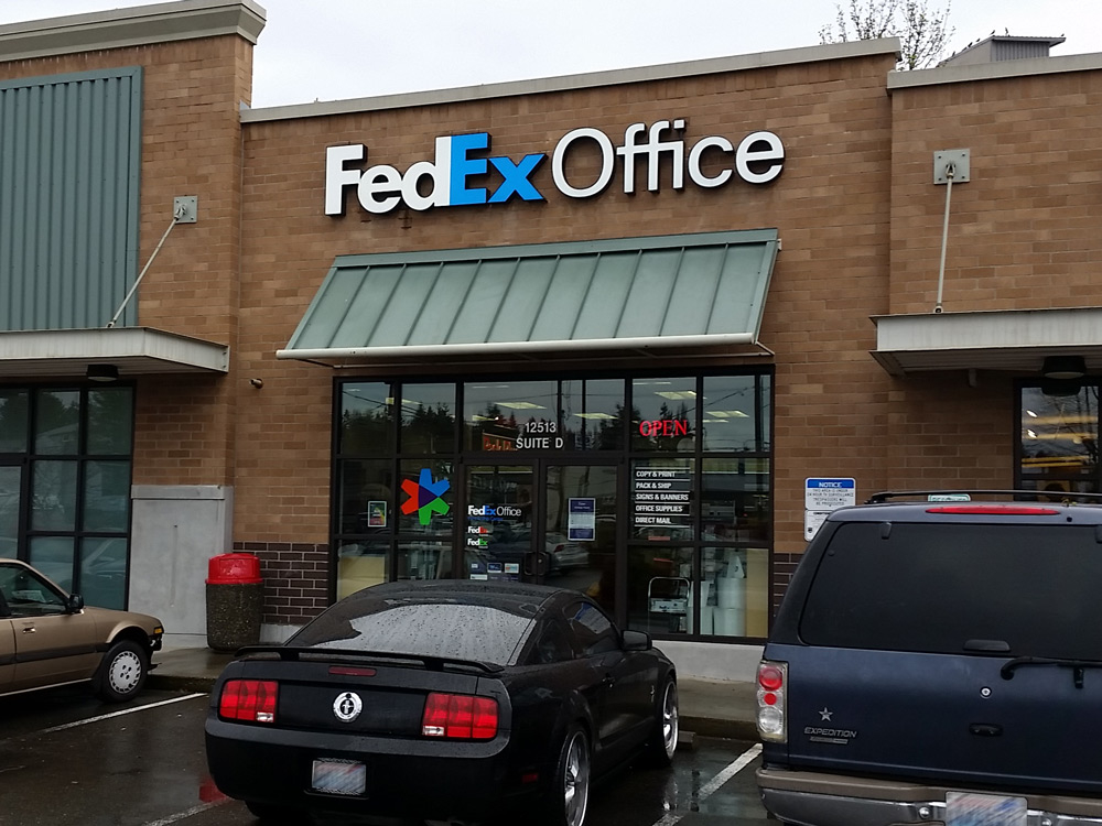Exterior photo of FedEx Office location at 12513 Lake City Way NE\t Print quickly and easily in the self-service area at the FedEx Office location 12513 Lake City Way NE from email, USB, or the cloud\t FedEx Office Print & Go near 12513 Lake City Way NE\t Shipping boxes and packing services available at FedEx Office 12513 Lake City Way NE\t Get banners, signs, posters and prints at FedEx Office 12513 Lake City Way NE\t Full service printing and packing at FedEx Office 12513 Lake City Way NE\t Drop off FedEx packages near 12513 Lake City Way NE\t FedEx shipping near 12513 Lake City Way NE