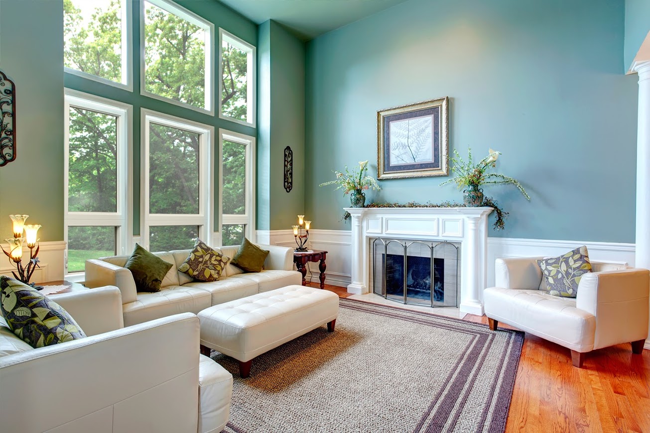 The EcoTek 3200 Series Windows in this living room bring in abundant natural light and showcase the lush greenery outside. Their tall design enhances the room’s spacious feel, while the clean lines blend seamlessly with the elegant, modern decor, creating an inviting and serene atmosphere.