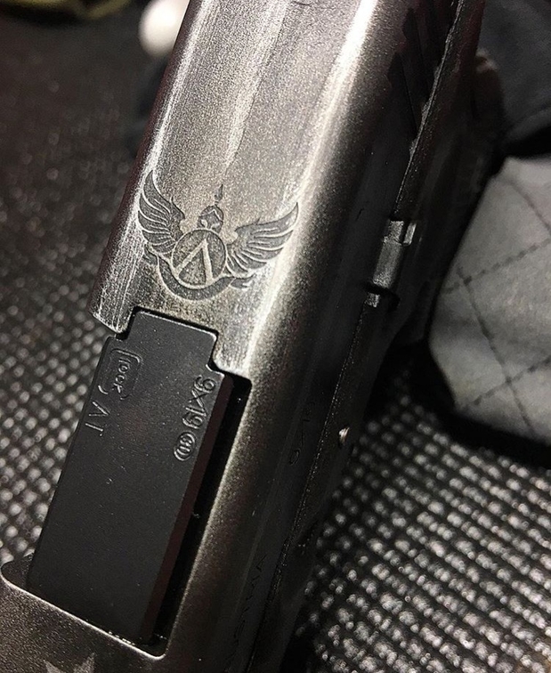 Images Armory Valentine, LLC Cerakote Coating, Laser Engraving & Custom Holsters