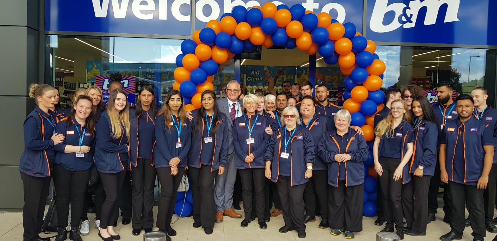 The store team at B&M's newest store in Sheldon pose in front of their wonderful new B&M Store, located on Coventry Road.