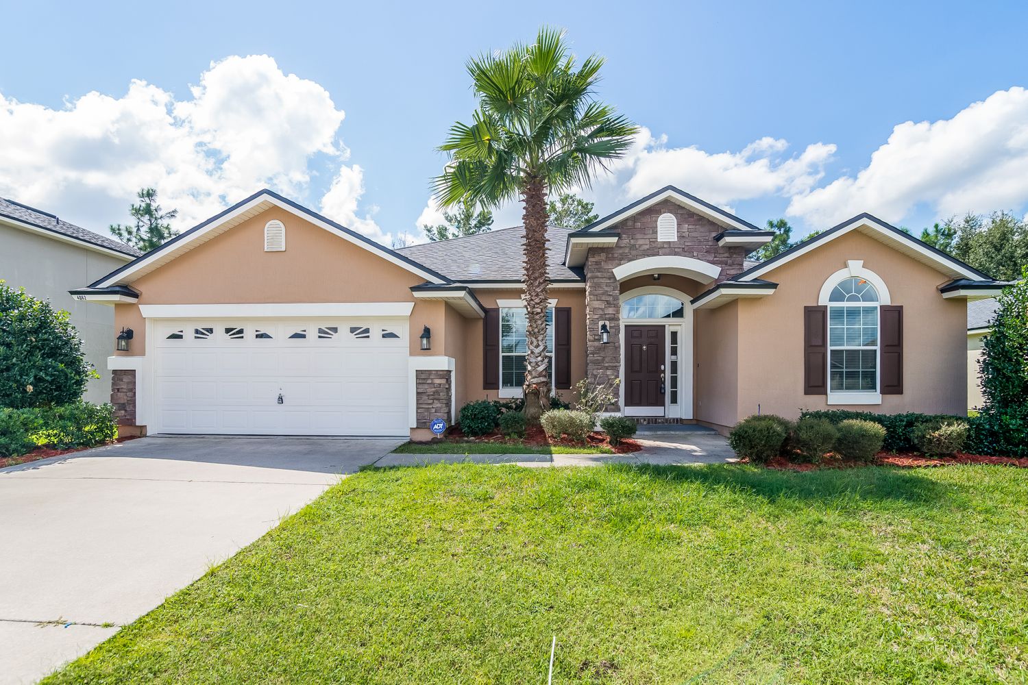 Beautiful home with a two-car garage at Invitation Homes Jacksonville.