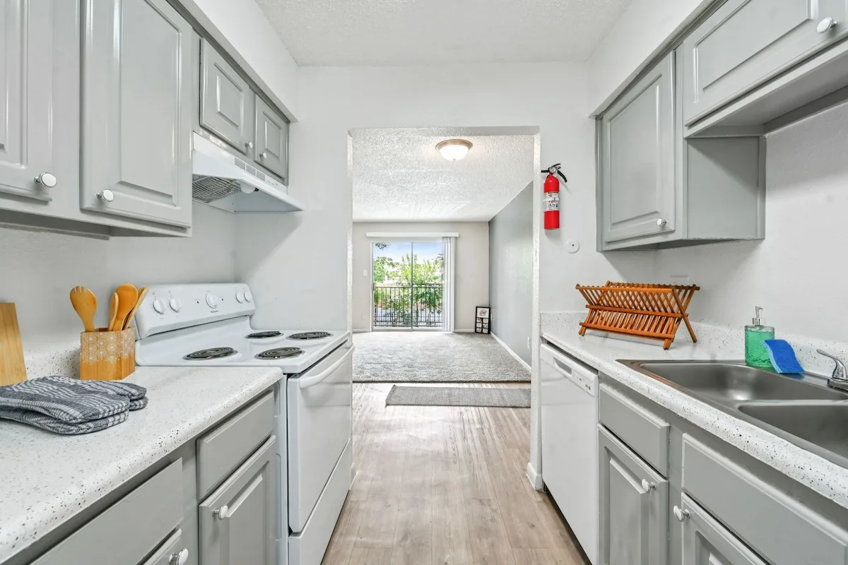 Bright narrow kitchen with modern finishes 