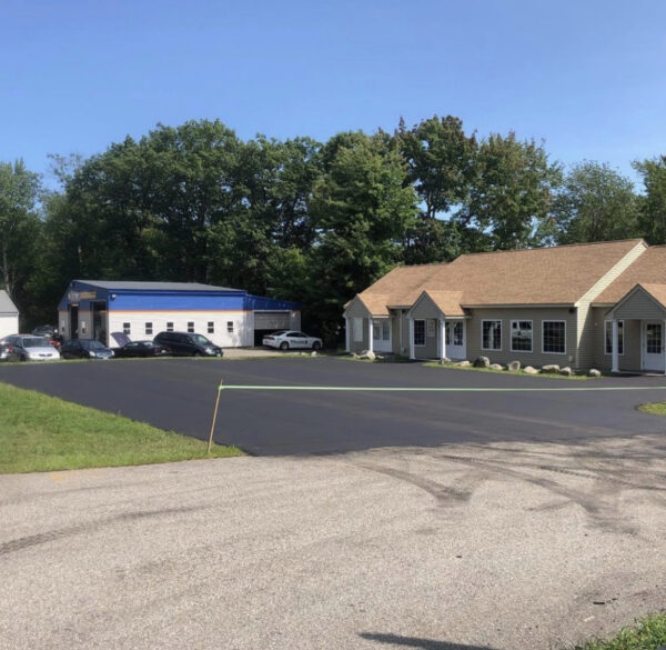 Commercial asphalt paving project in Maine, using advanced paving equipment for long-lasting results.