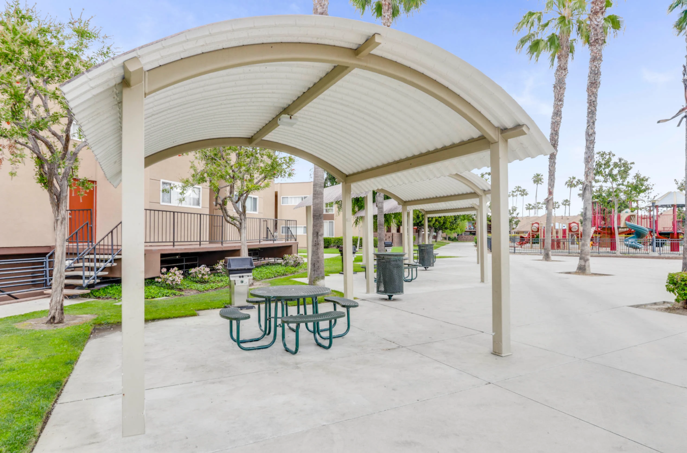 White canopy with picnic table