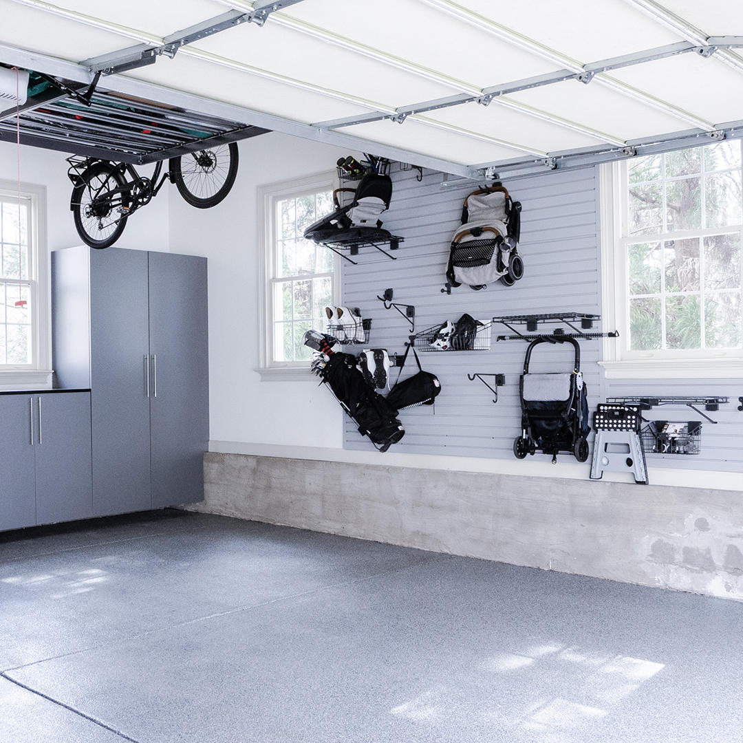 Let's get your garage in gear with the most advanced flooring technology available, and a boat load of garage storage solutions. From overhead storage, to slatwall for organizing or custom designed cabinets and workbenches, we've got you covered. Need a special rack for your fat tire mountain bike?