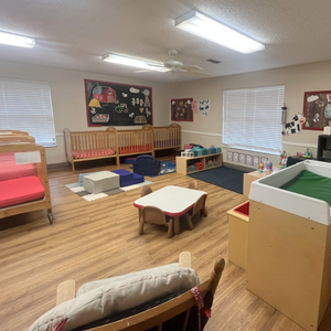 Bright and colorful preschool classroom at Childcare Network with age-appropriate learning materials