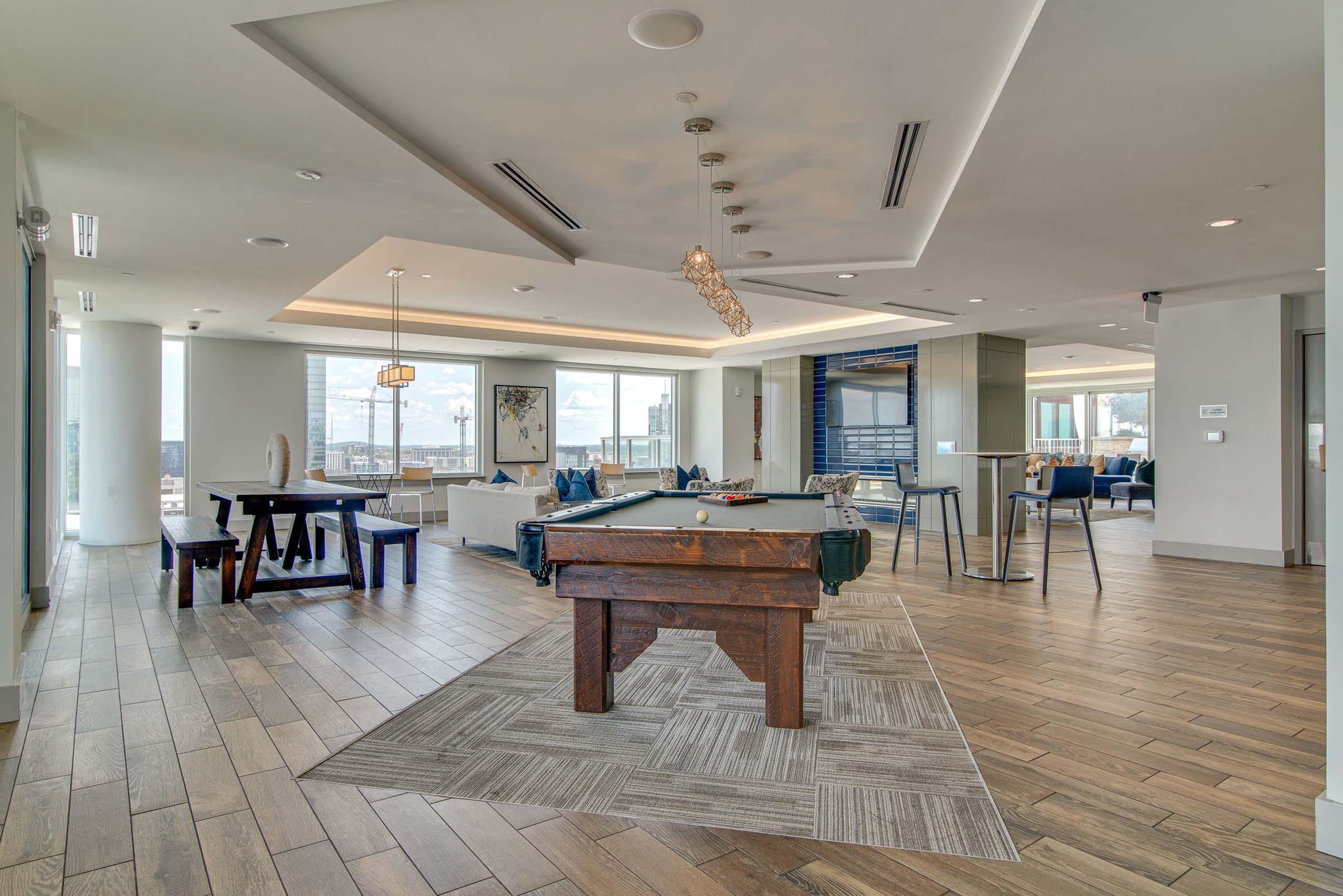 resident clubroom with pool table and ample seating