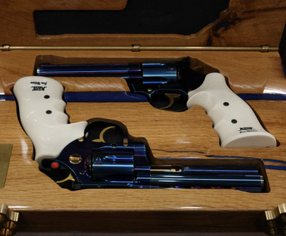 A matched pair of Korth revolvers in presentation case — an exceptional collector's set available at Shoot It LLC, Phoenix's destination for rare and high-end firearms.