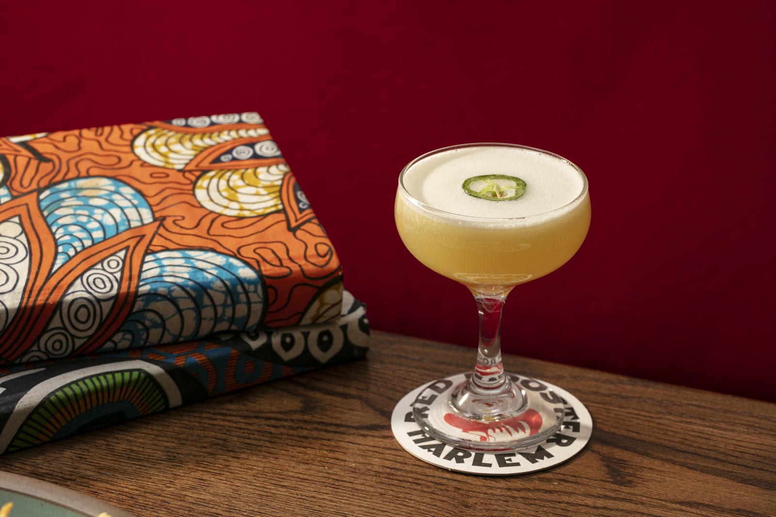 The cocktail bar at Red Rooster Harlem, part of the restaurant's bar and lounge area. Located in Harlem.