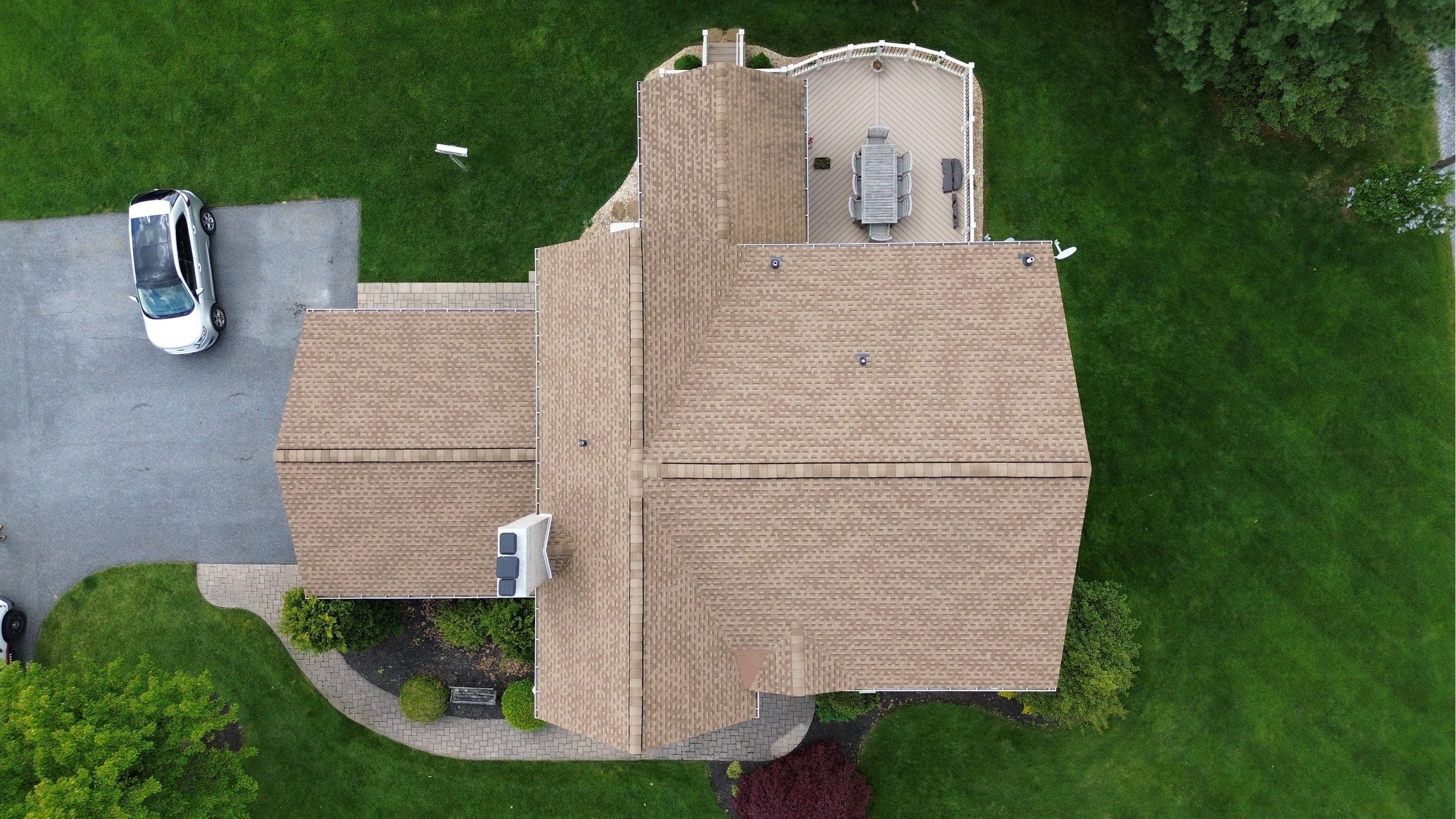 Aerial overhead view of a completed architectural shingle roof replacement in Westminster, Maryland, 