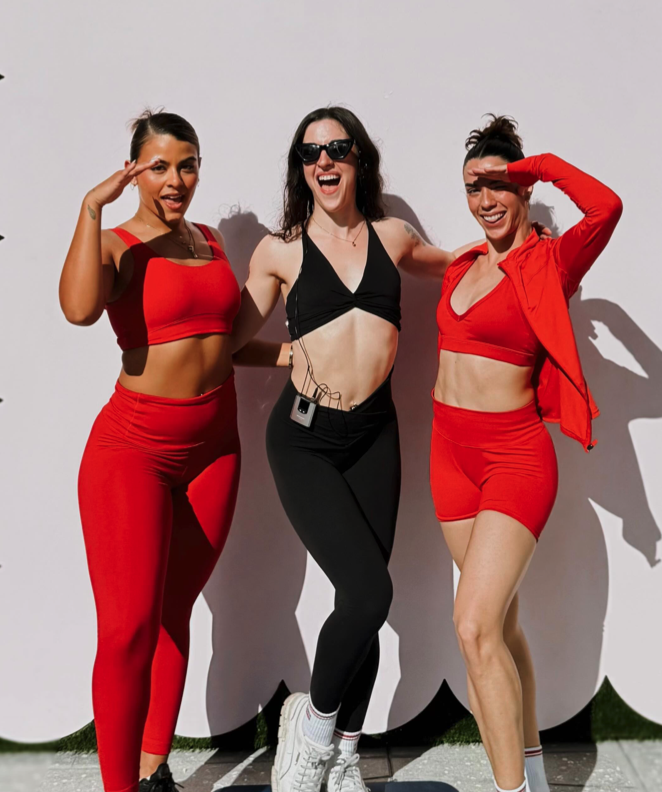 Pure Barre Aventura instructors and members in workout gear — barre fitness community near Sunny Isles Beach and Bal Harbour