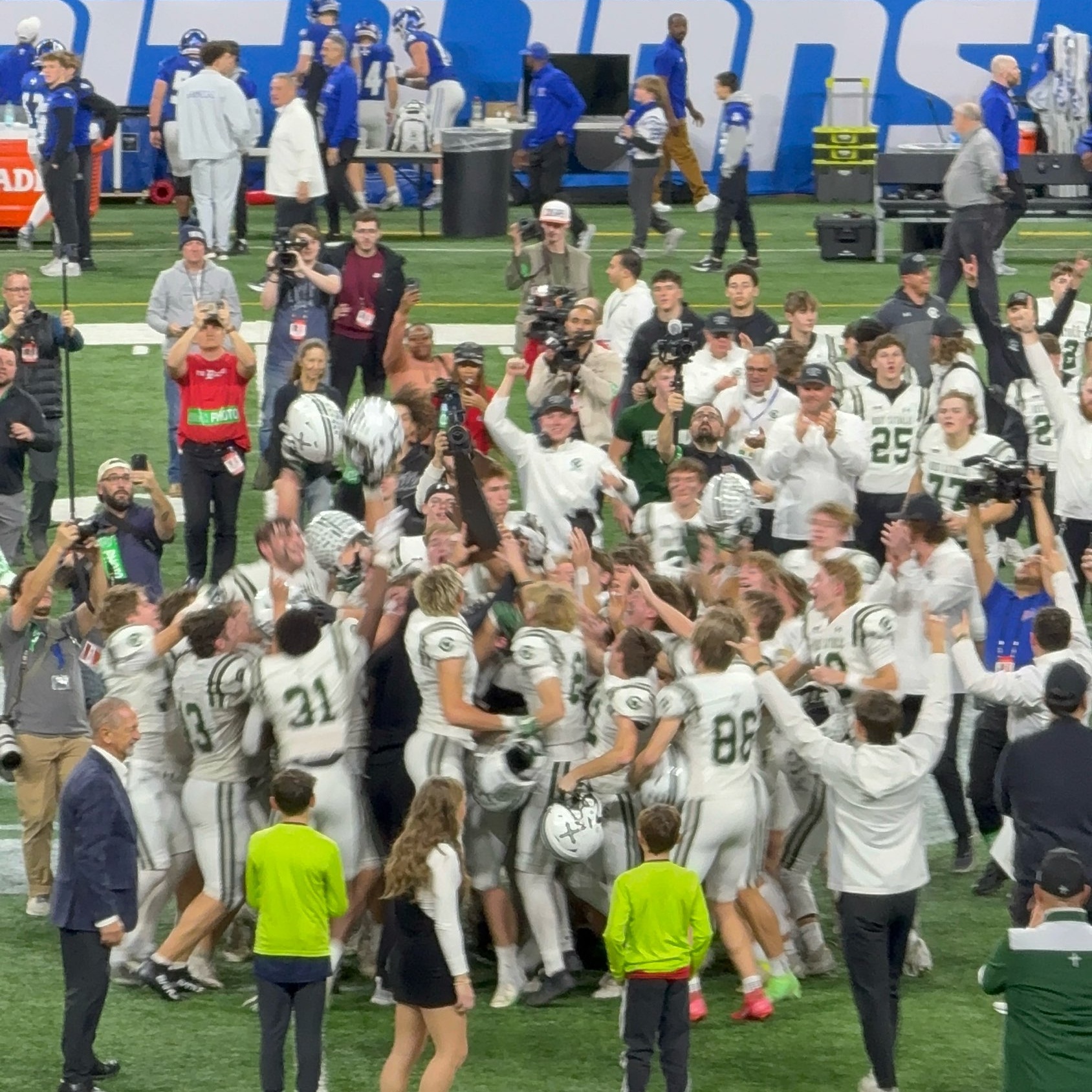 Jim Blaszak's sons' varsity football team at the local high school won the State Title yesterday, knocking off last year's champion!