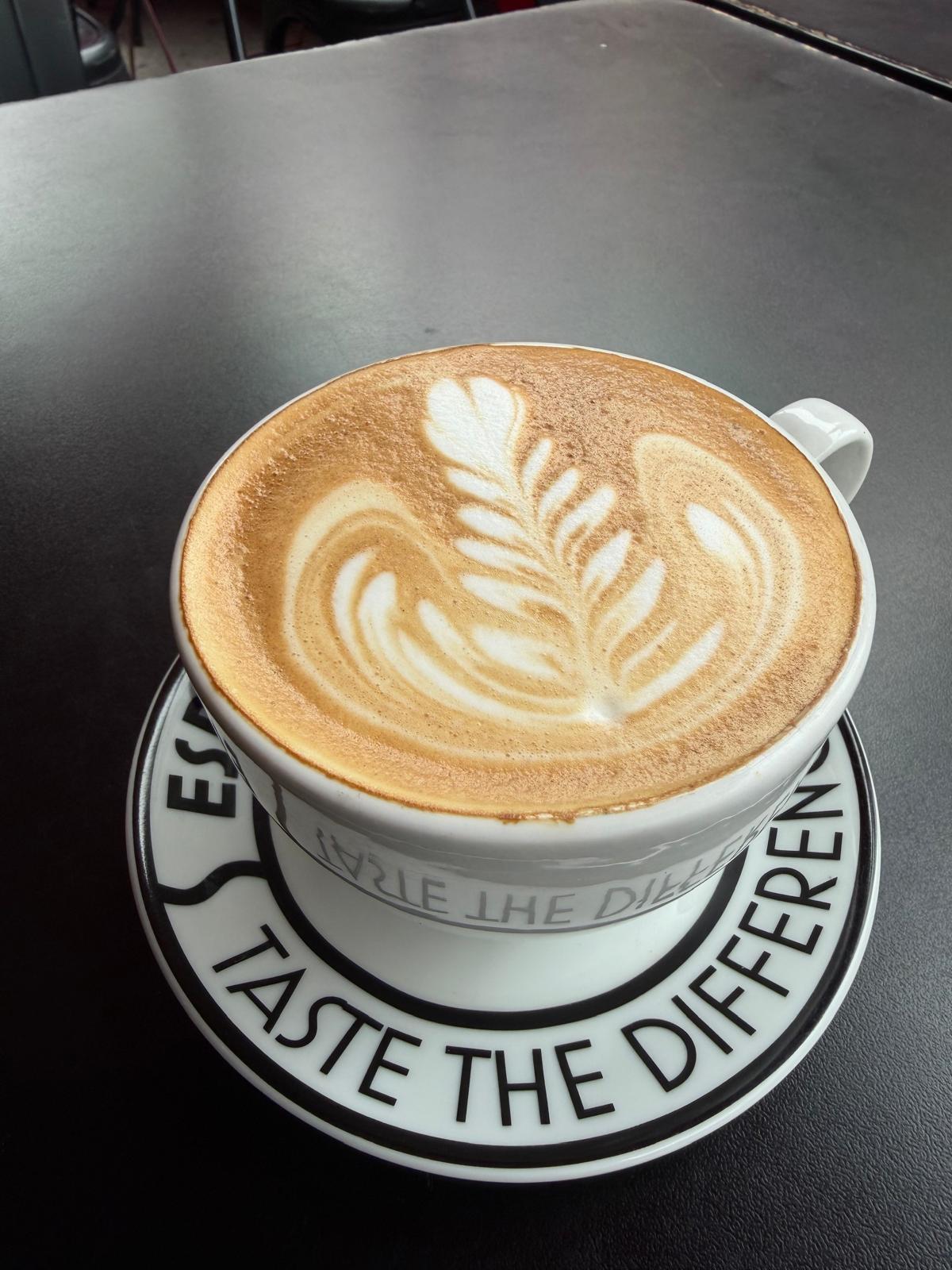 Rosetta design in hot latte