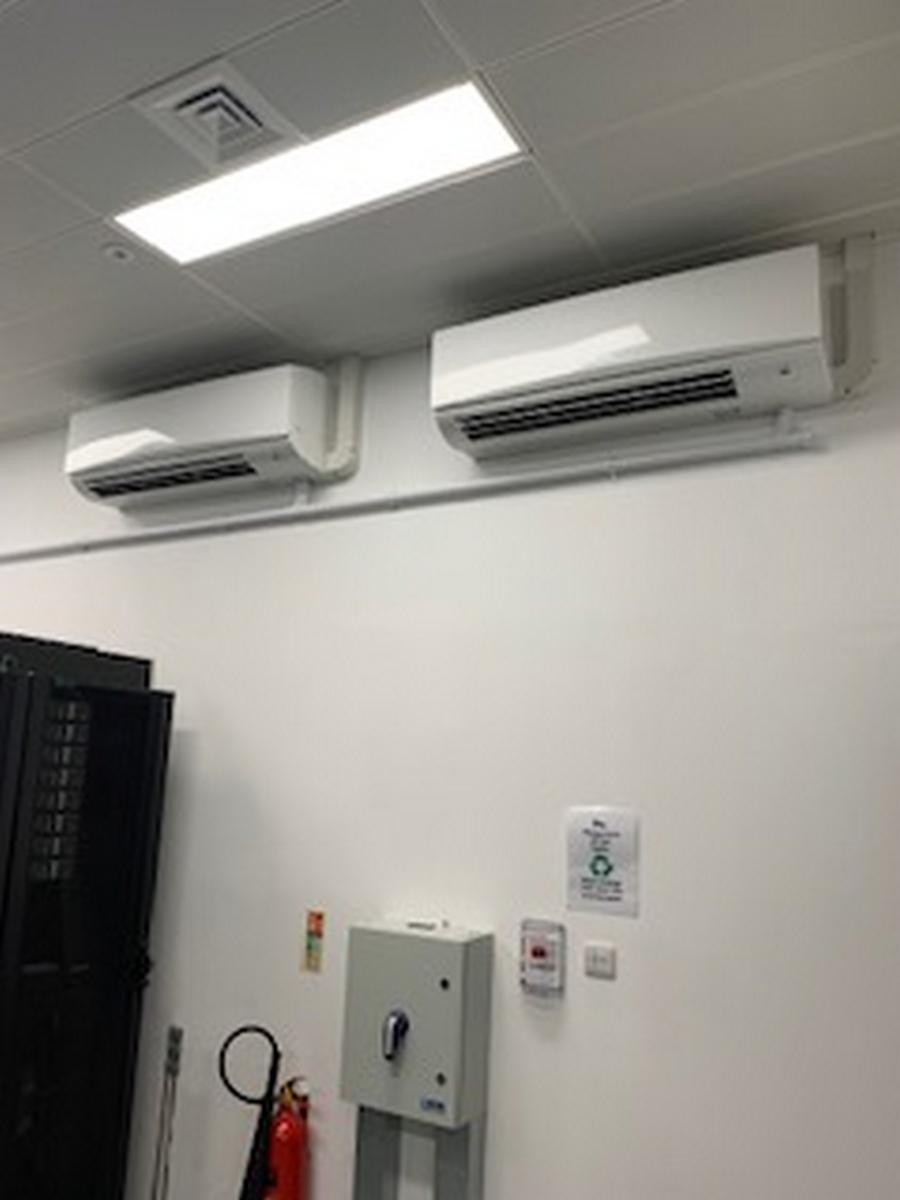 Two internal air conditioning units from a Lewisham installation