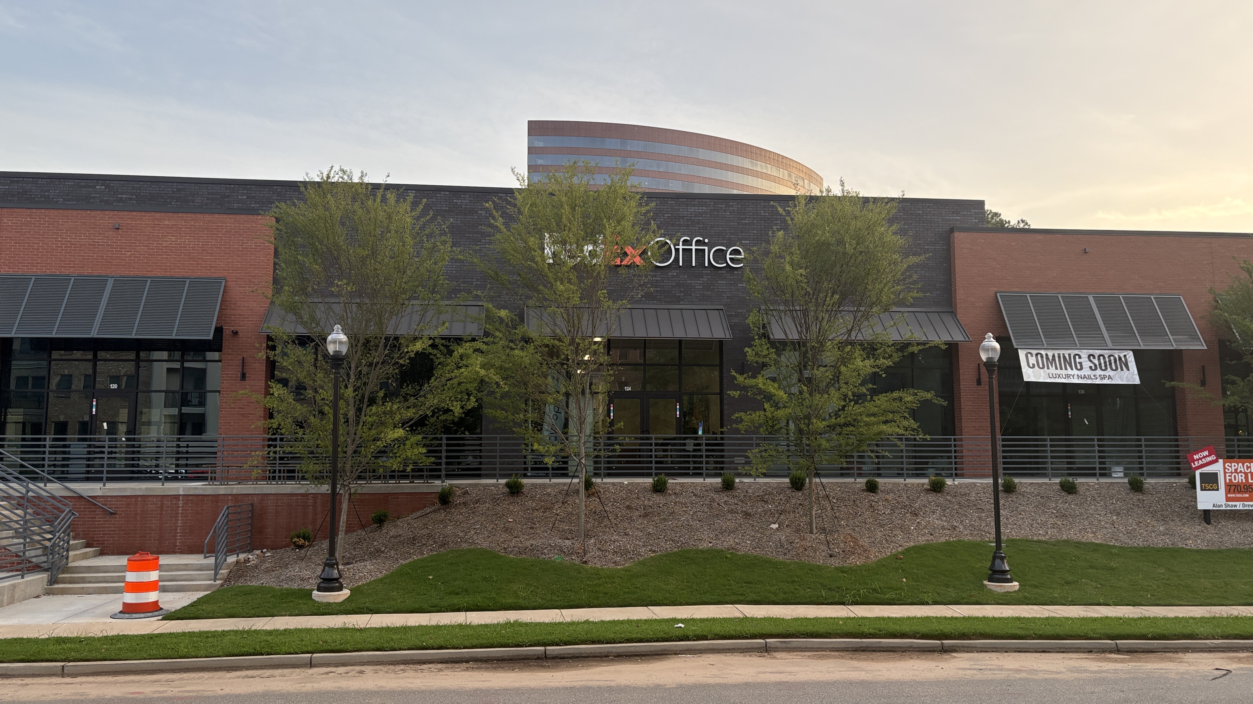 A view of the FedEx Office building and surrounding shopping center at 3581 Vinings Slope SE in Atlanta, GA.
