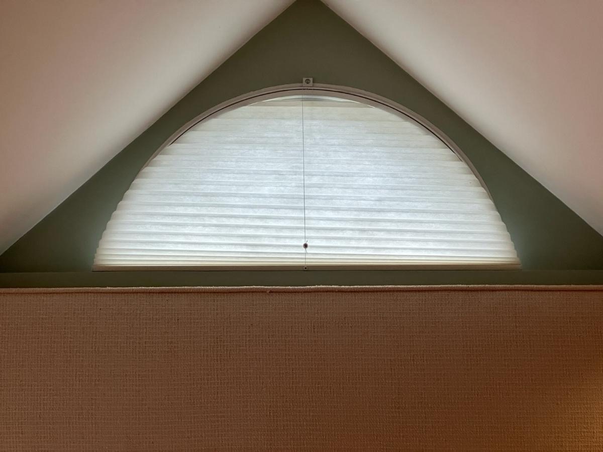 Cellular shades are a great choice for odd shaped or arched windows.