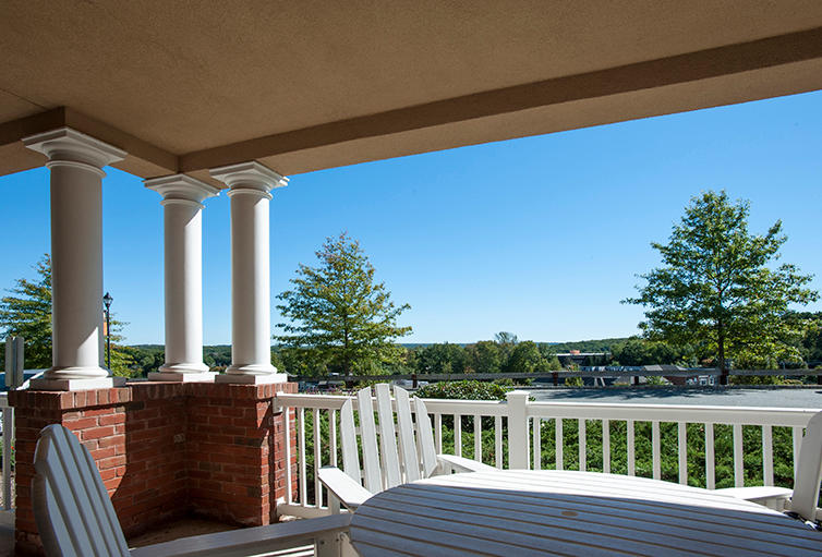 Mt. Arlington Senior Living balcony with tables and chairs