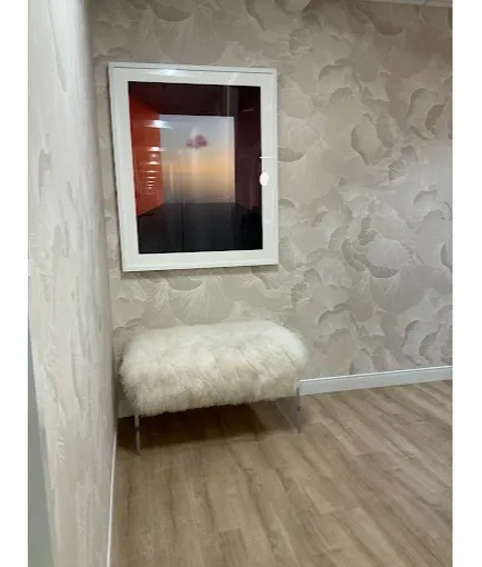 Private consultation room for Women’s Wellness Institute of Dallas and cosmetic gynecology services, designed for comfortable, confidential patient care and personalized treatment discussions.
