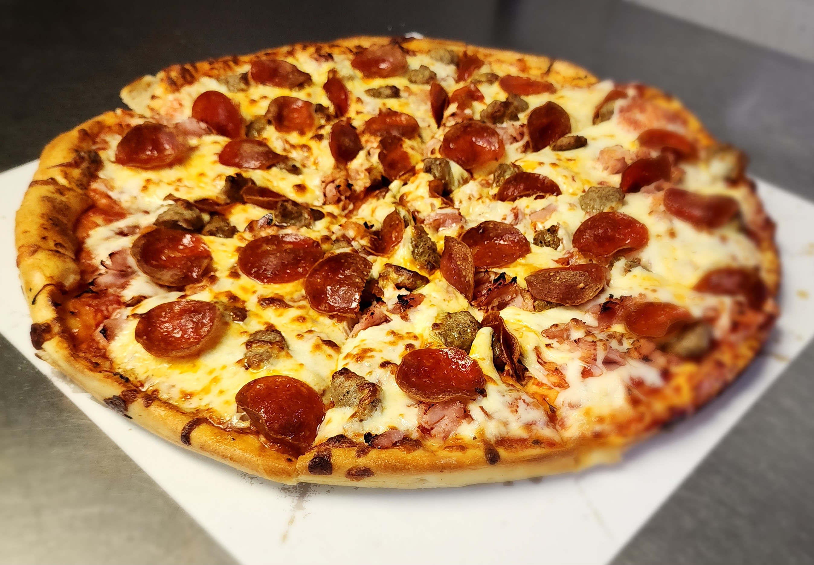 Ham, Bacon, Sausage, Ground Beef and Pepperoni.