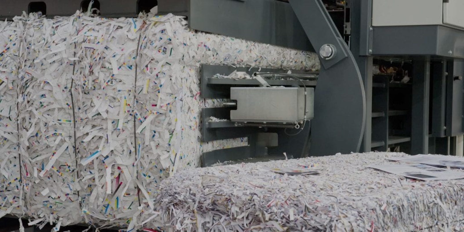 Bales of shredded paper at American Document Destruction awaiting transport to the paper recycling plant