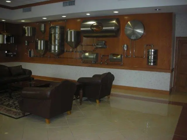 Completed diagonal tile flooring installation in a furnished residential interior. 