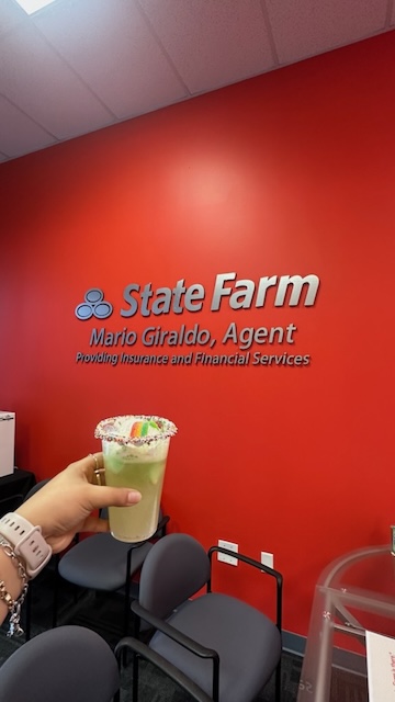 Celebrating the holidays at Mario Giraldo's State  Farm office!