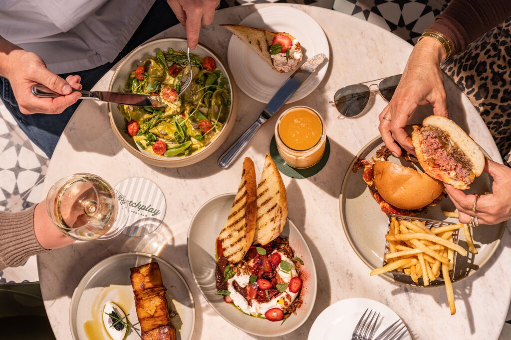 Our menu is built for the moments after the game: seasonal ingredients, bold flavors, and dishes designed to share.