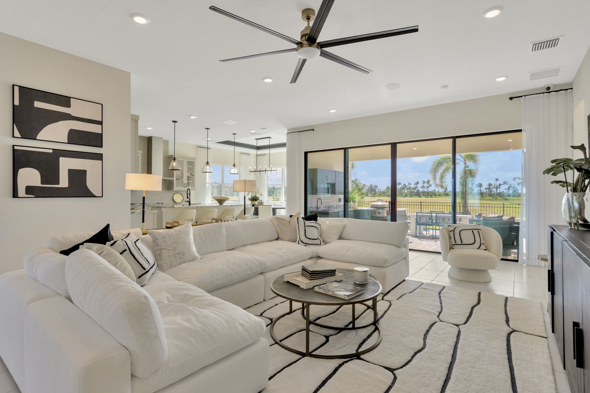 The Living Room of a DRB Homes Eider Home Plan at Biscayne Landing at Seaire in Parrish, FL.