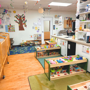 Bright and colorful preschool classroom at Childcare Network with age-appropriate learning materials