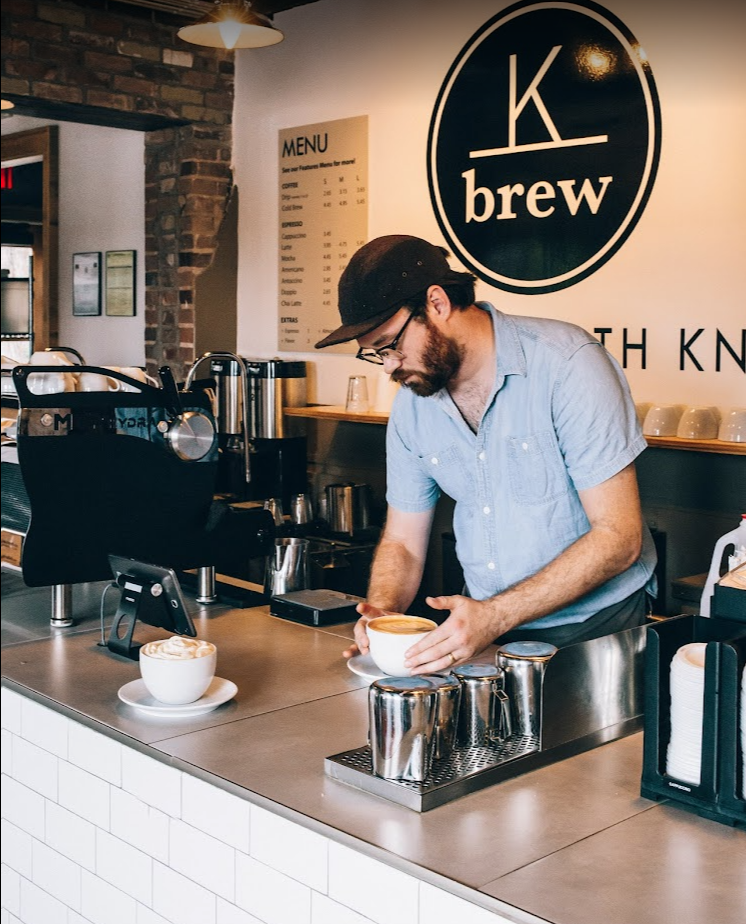 K Brew Barista at front counter