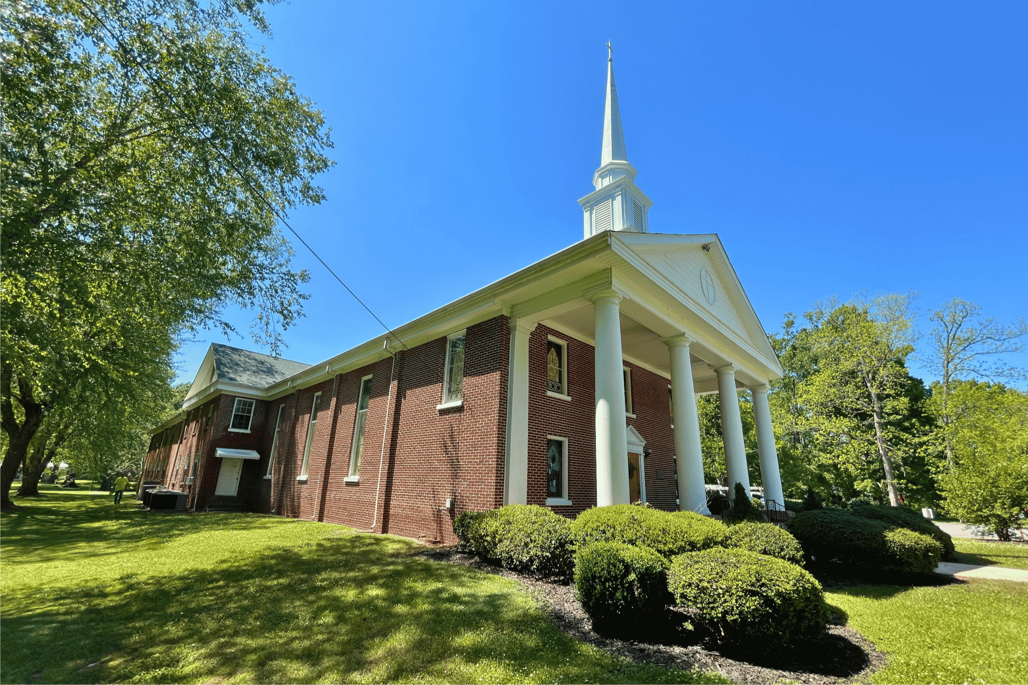 We specialize in ultra-low-pressure soft washing to safely restore delicate historic brick and steeples without causing any masonry damage.