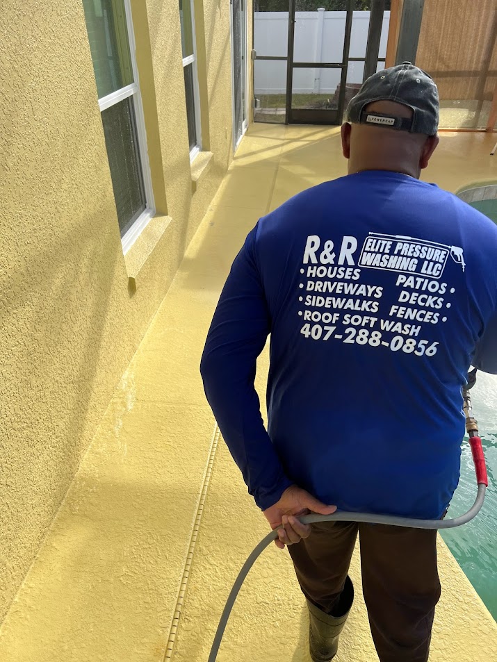 Professional pool deck cleaning in Davenport, FL, removing algae, mildew, dirt, and buildup from outdoor surfaces.