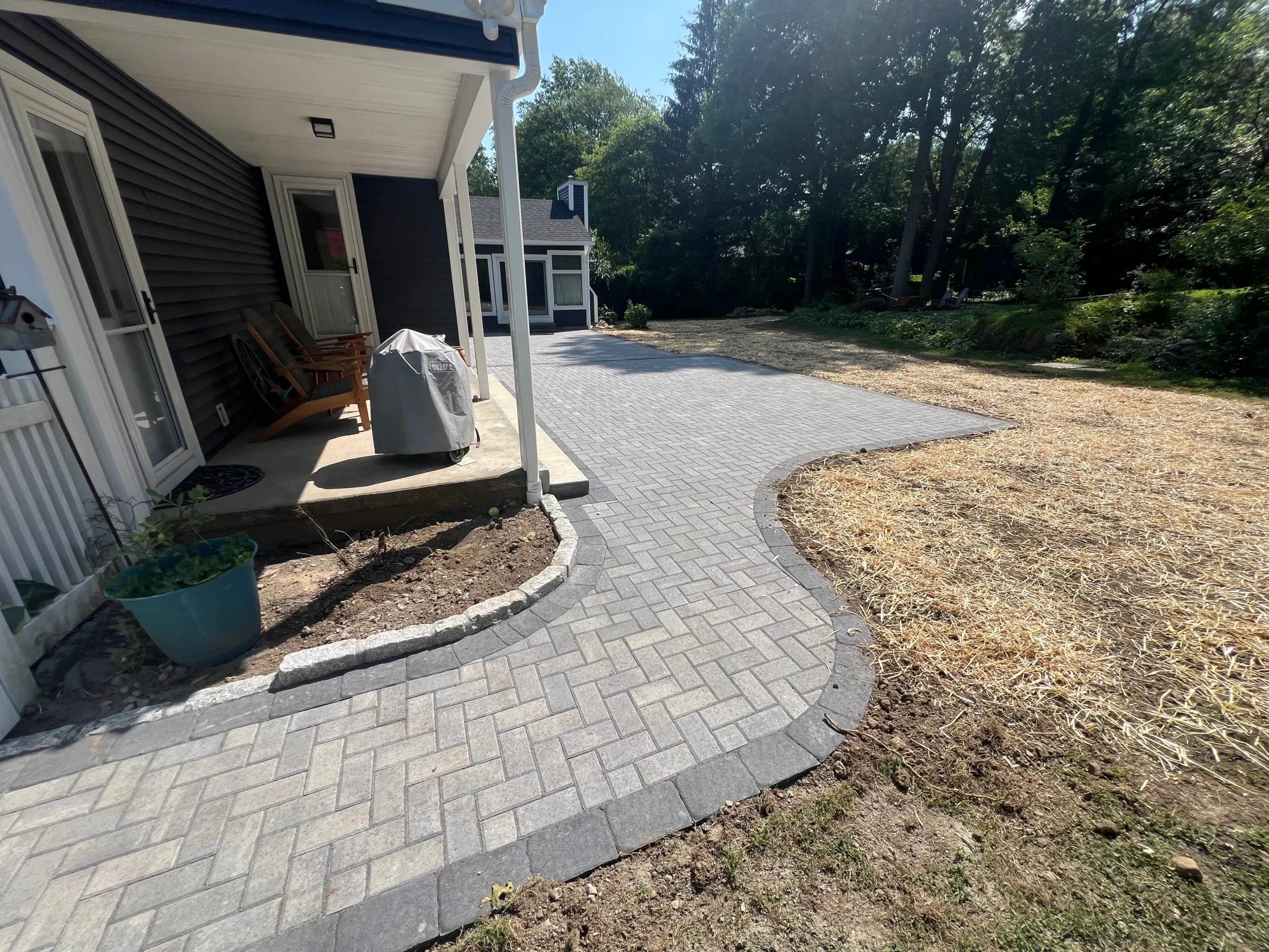Multi-level paver patio construction in Trumbull - Multi-Layered Paver Patio, Trumbull project by General Masonry LLC.