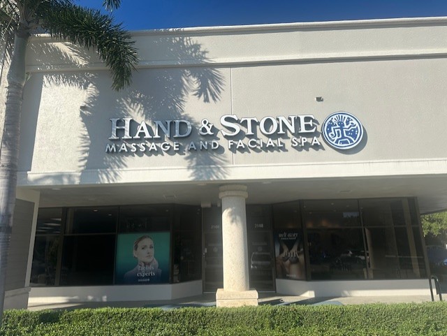 Hand &amp; Stone Massage and Facial Spa Logo