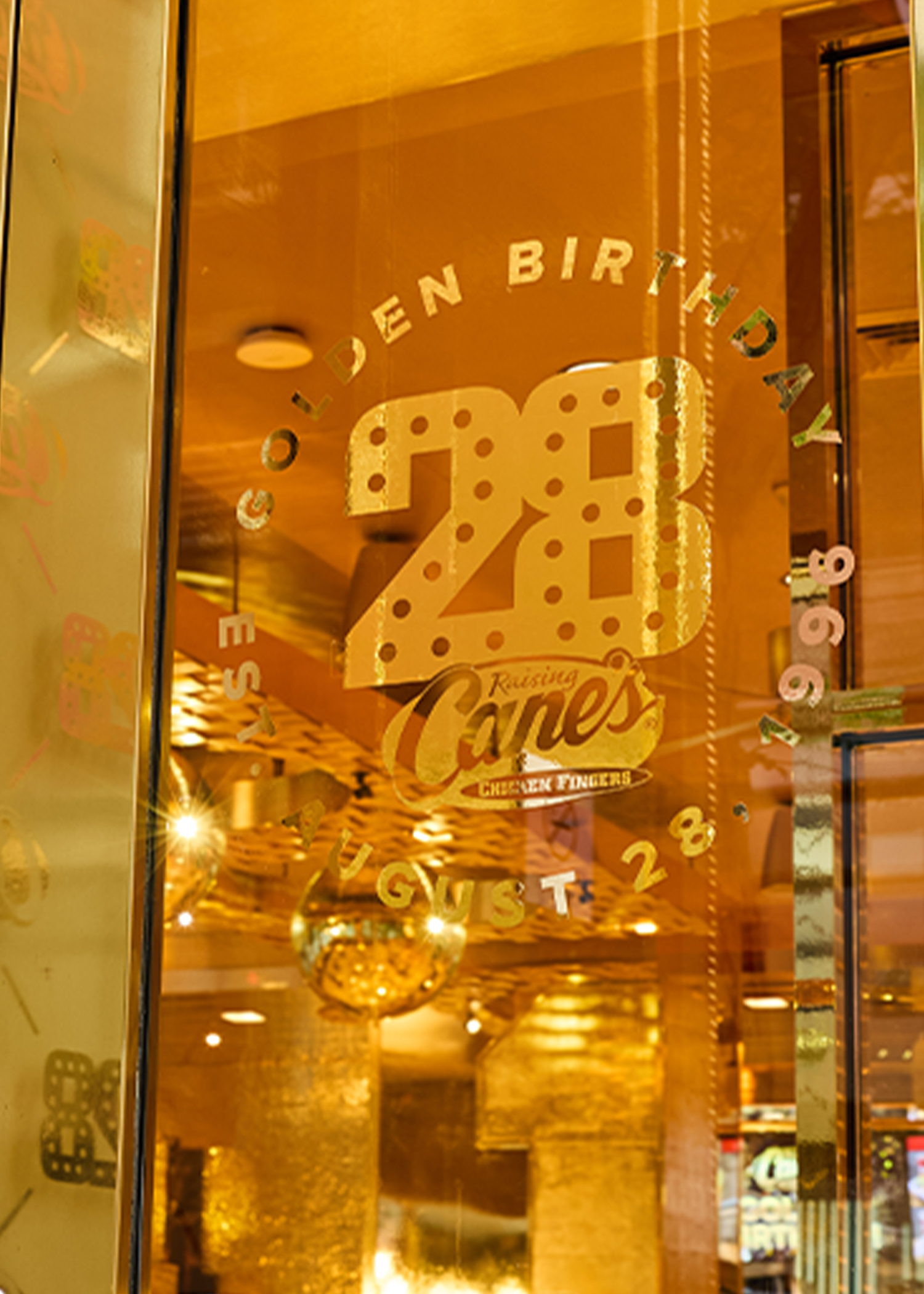 Raising Cane's Boston golden birthday sign