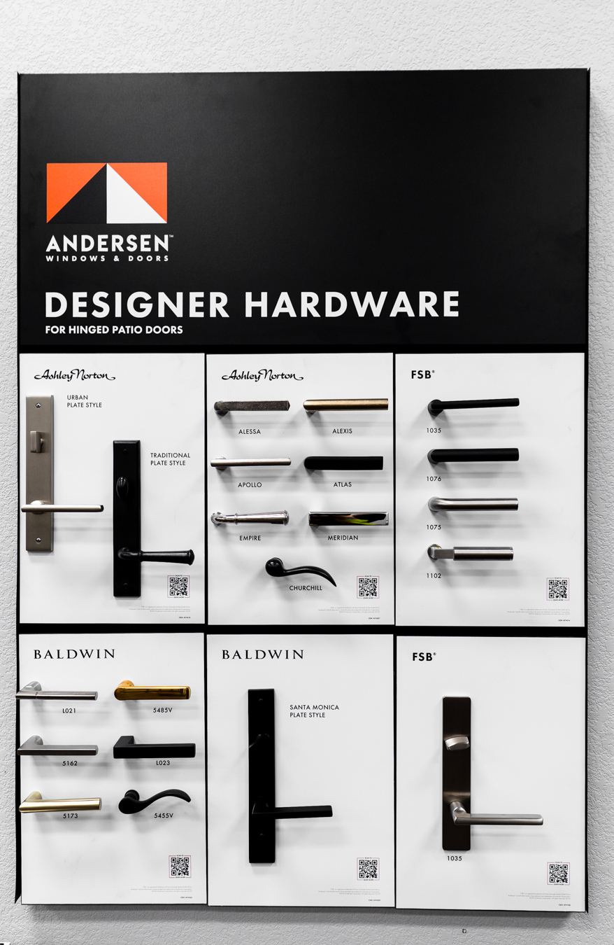 Display board showcasing Andersen designer hardware for patio doors by Ashley Norton, Baldwin, and FSB at Builders FirstSource.