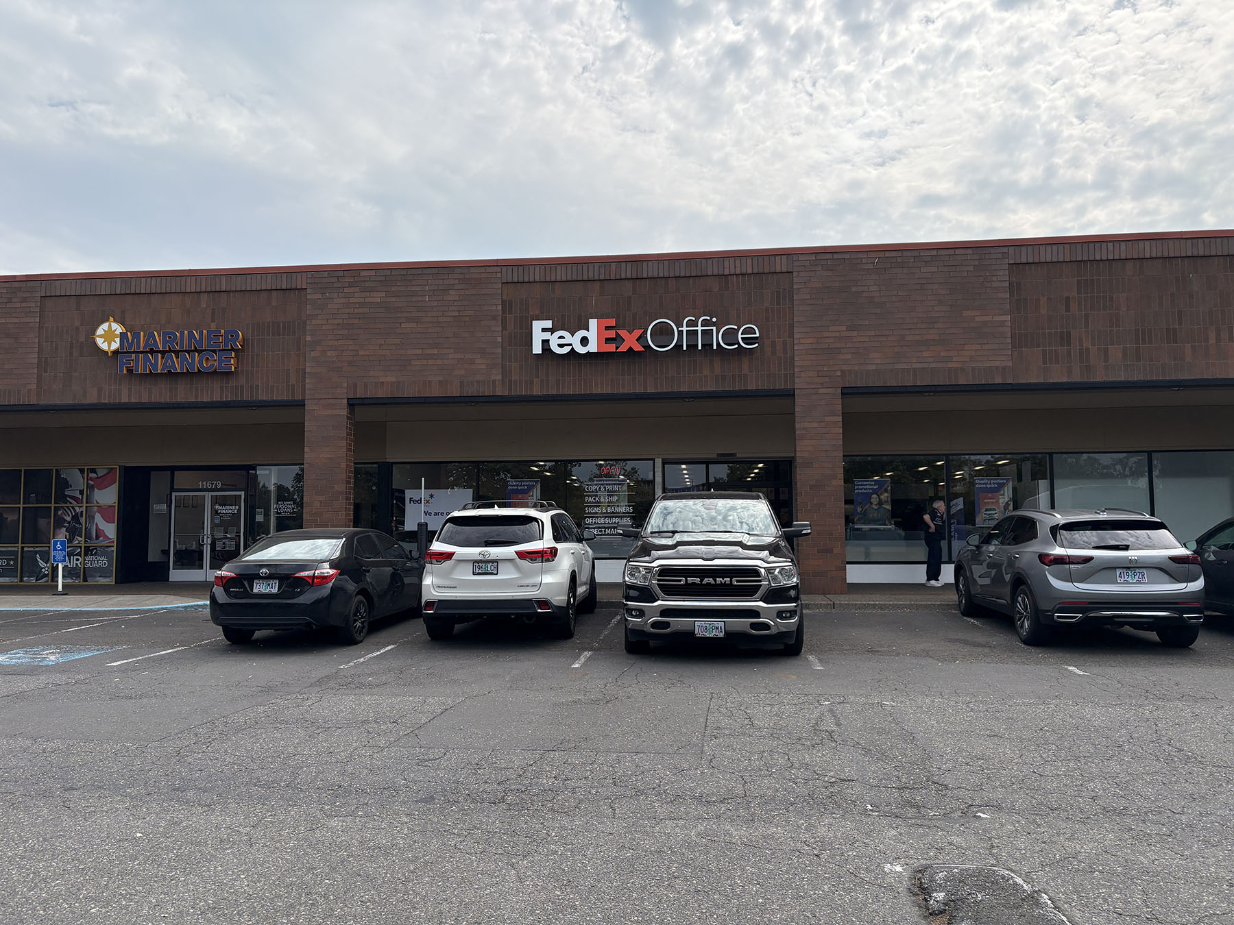 Storefront at Beaverton Town Square &ndash; FedEx Office in Beaverton, Oregon at Town Square with storefront signage, convenient parking, and easy access for printing and shipping services.