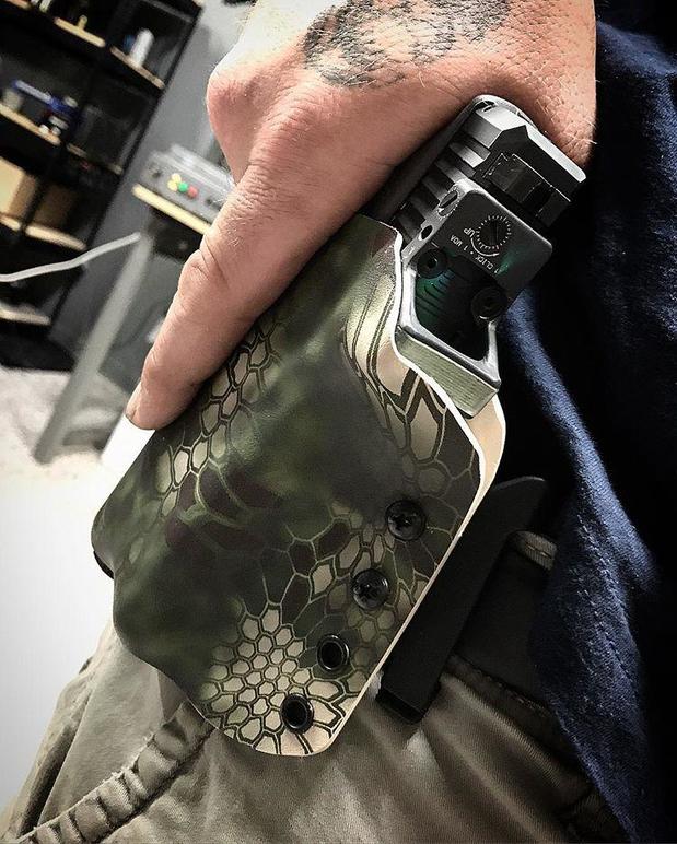 Images Armory Valentine, LLC Cerakote Coating, Laser Engraving & Custom Holsters