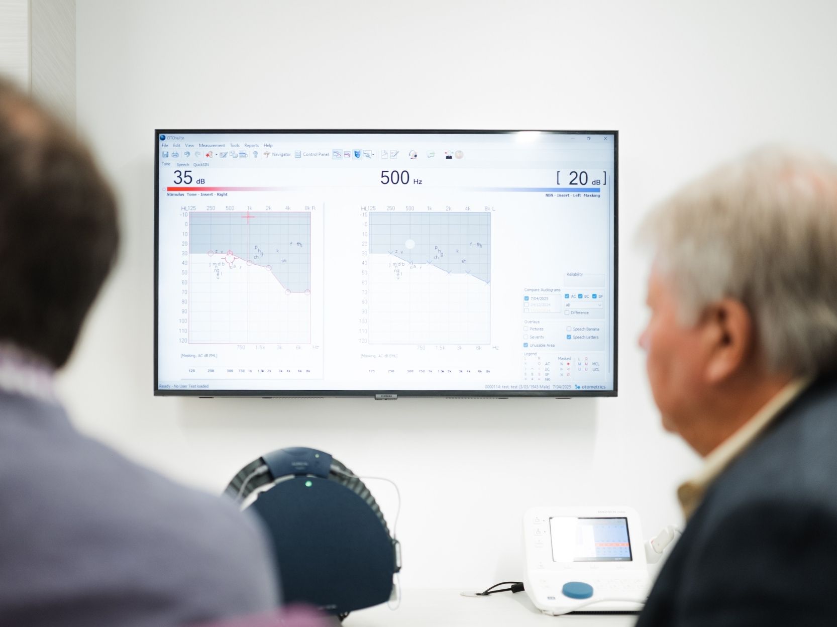 Man discussing his audiogram with the audiologist