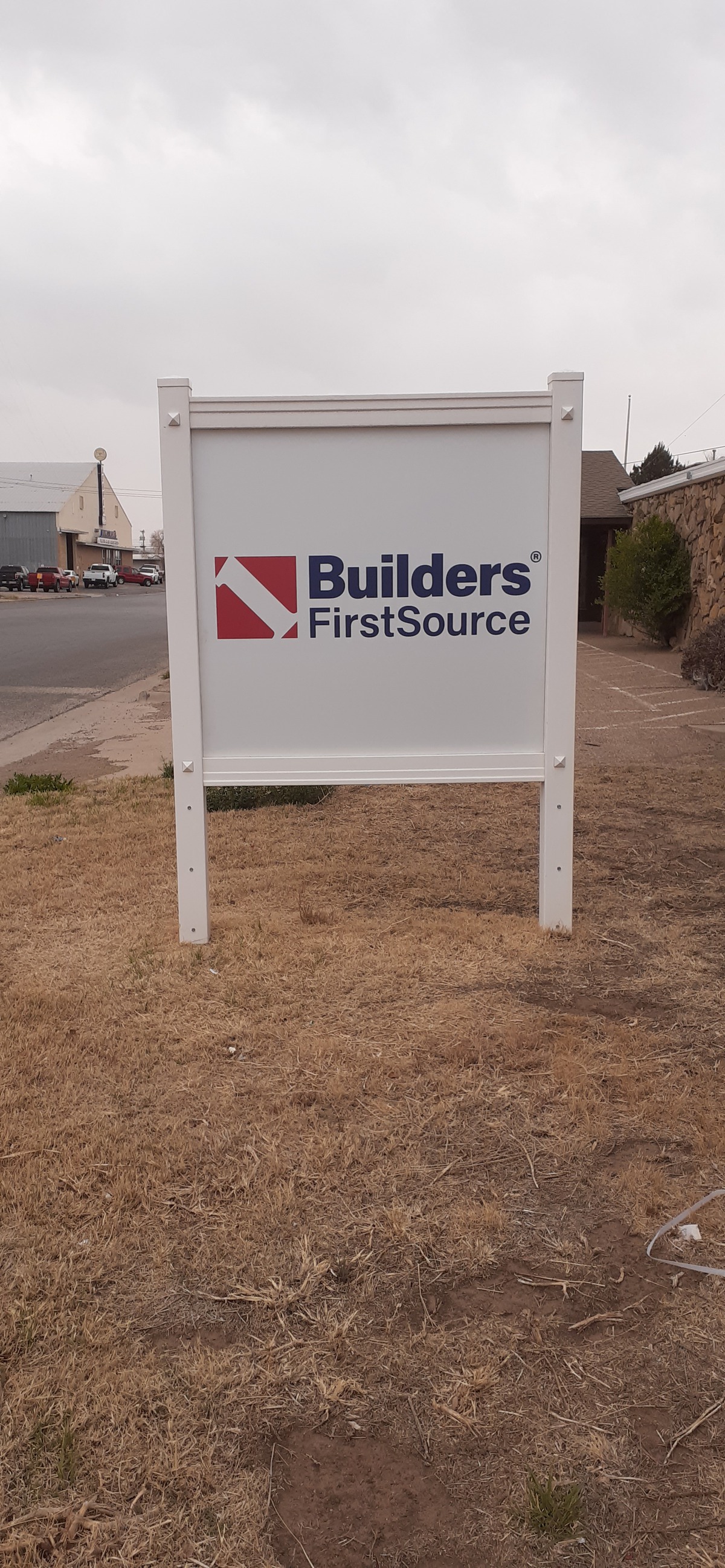 Builders FirstSource Building Materials Millwork Facility in Lubbock TX Street Sign.