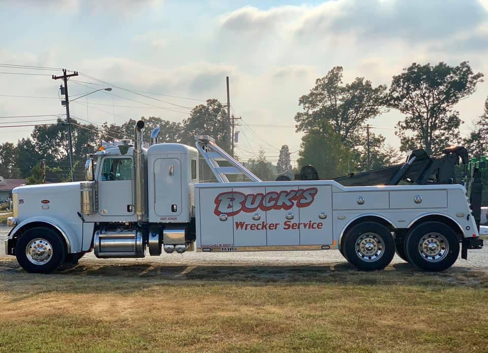 Founded in 1989 by Shawn Clubb, Buck’s Wrecker Service has grown over 30 years to become one of North Carolina’s finest auto service providers. We have always known that by hiring experienced, highly trained towing and recovery specialists, we could deliver the timely and professional services our neighbors throughout the Davidson, Forsyth, Rowan David, Iredell, Guilford and Randolph county areas deserved.
Comprehensive Towing, Recovery, Repair & More...
Buck’s Wrecker Service offers a comprehensive array of truck and auto services to customers in the greater Thomasville, High Point, Mocksville and Statesville areas. We work tirelessly to make ourselves available for emergency towing, recovery and roadside assistance services 24 hours a day, seven days a week. The services we offer include but are not limited to:
Truck & Auto Towing
Mobile Truck Repair
Accident Recovery
Environmental Cleanup
Roadside Assistance
Truck & Auto Repair
Equipment Transportation

Call (336) 886-4004 or Click buckstowingandrecovery.com to find out more!