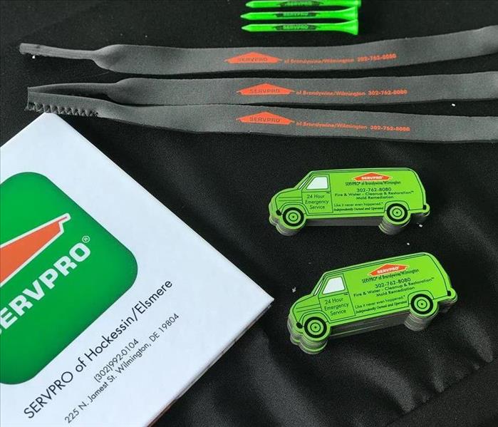 Here are some samples of goodies we gave out a recent golf outing.  SERVPRO green golf tees, SERVPRO sunglasses' bands and magnets.  There was also brag book sitting out with some of our odd jobs we have completed.