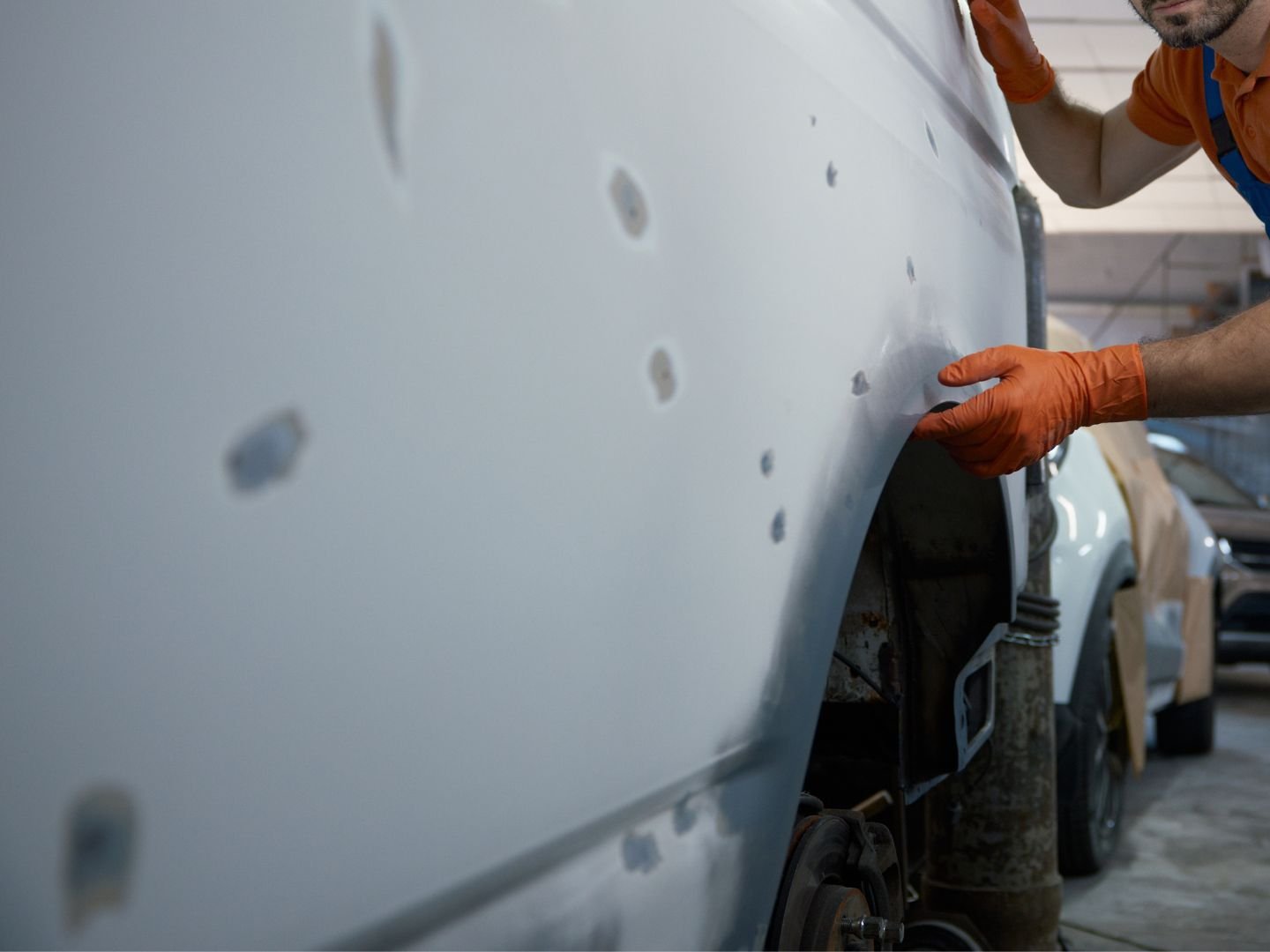 Every dent and imperfection requires precise attention. Our certified technicians carefully repair and smooth every spot by hand, ensuring the body panels align perfectly with original manufacturer standards before painting.
