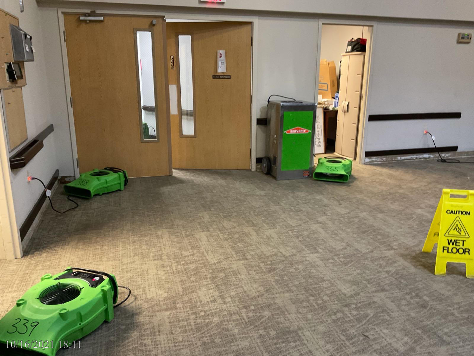 SERVPRO equipment drying a commercial building after experiencing a water damage.