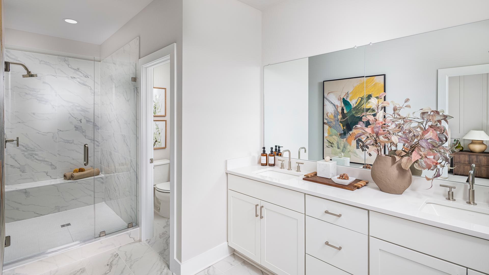 Relaxing primary bath with a dual-sink vanity