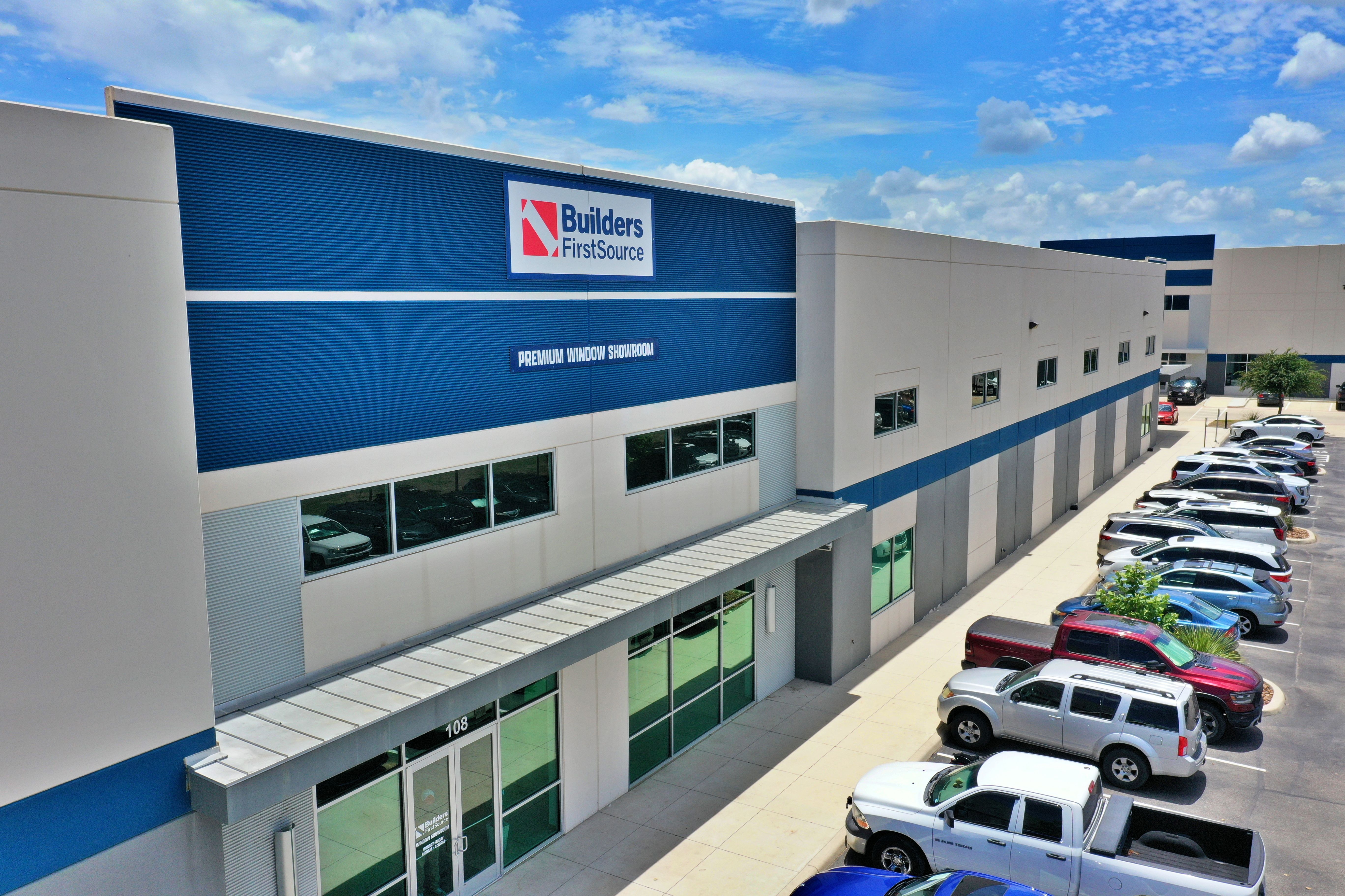 Aerial view of the Builders FirstSource Premium Window Showroom in San Antonio, featuring a modern b 