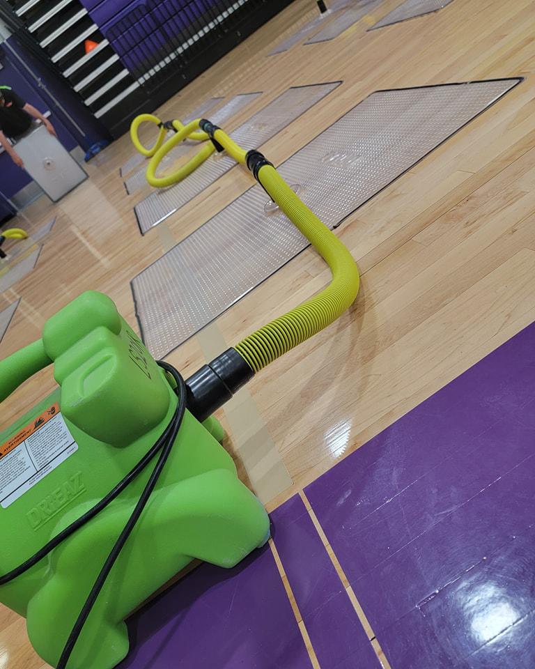 Our team is setting up our dry mat system to ensure a complete dry for this gym floor.